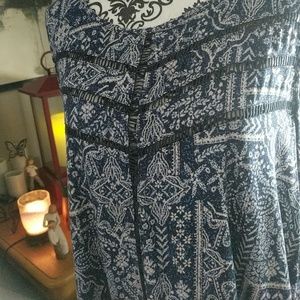 Blue patterned tank.